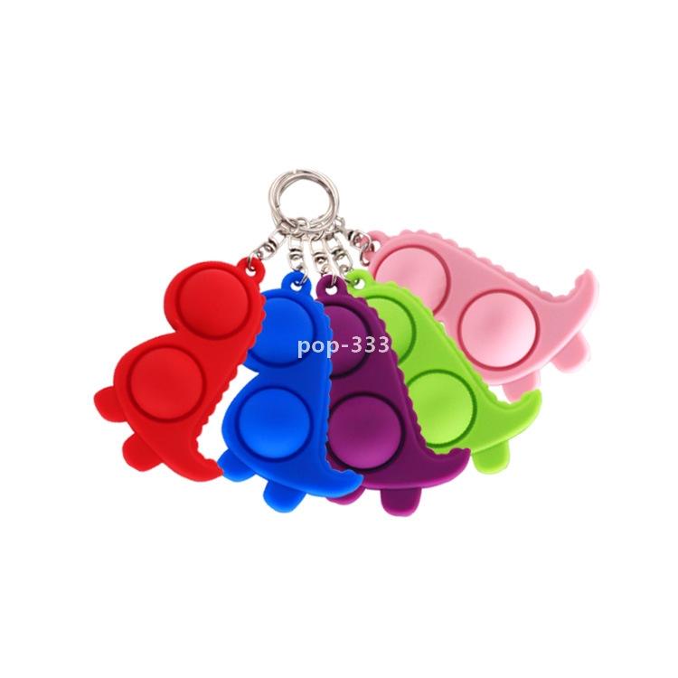 Anti-rat pioneer press silica gel key ring small dinosaur toy finger bubble music